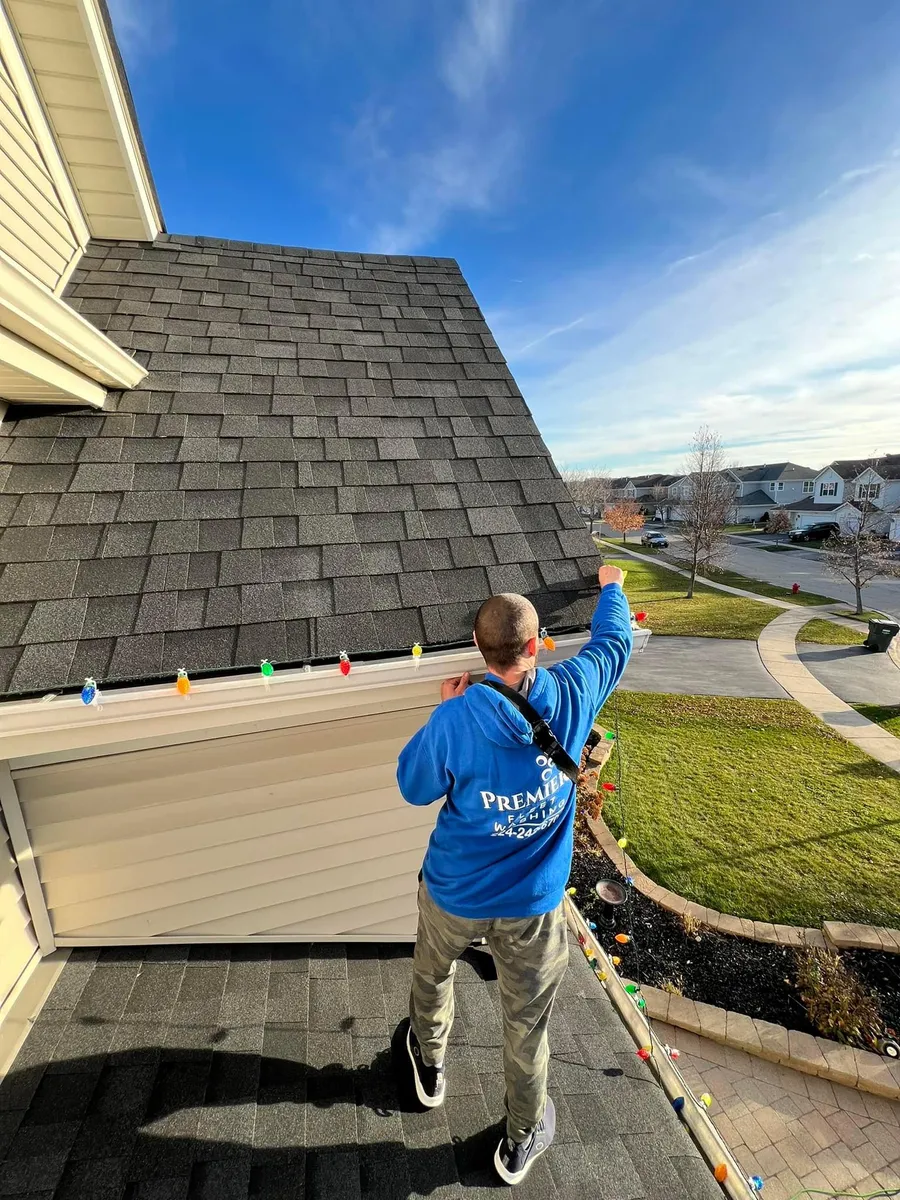 Holiday lighting installation in progress